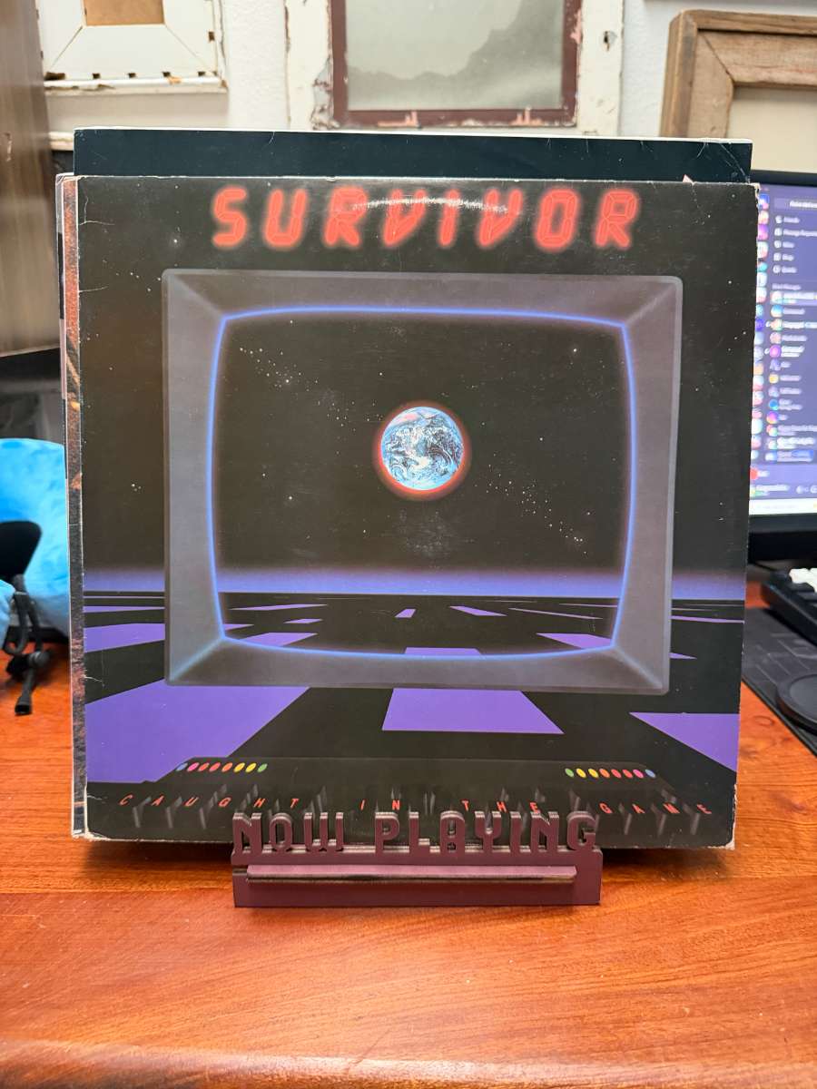 Survivor – Caught in the Game sleeve